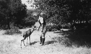 Pat Gasser with a tame fawn at the ranch.